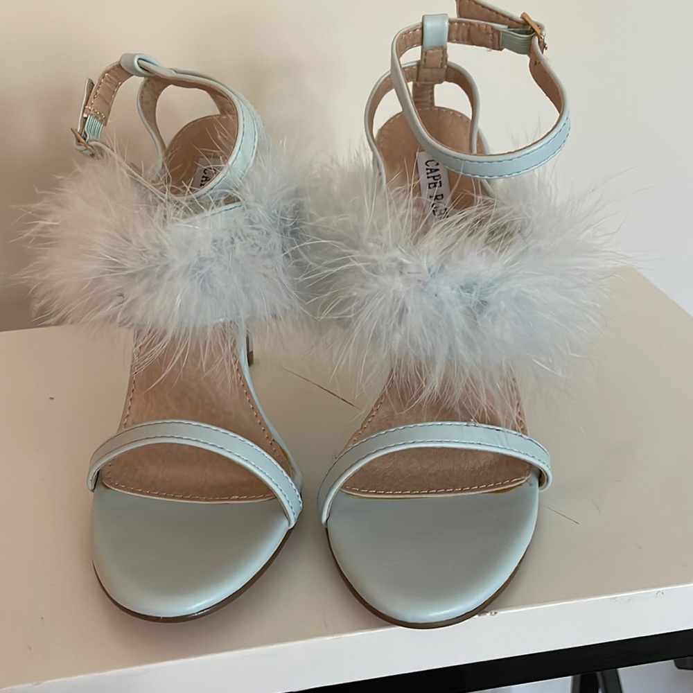 Cape Robin, high heel light blue heels, maribu on the front.  Worn twice